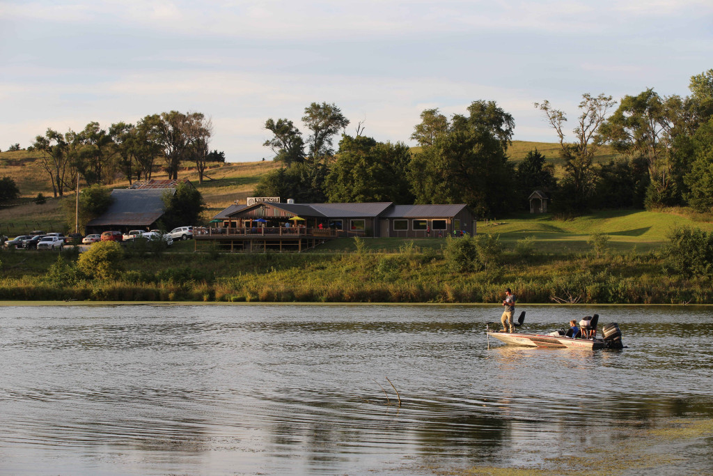 Boating on Summit Lake with restaurant in the background.