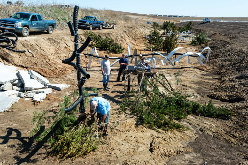 Biologists doing aquatic habitat work at Flanagan Lake.