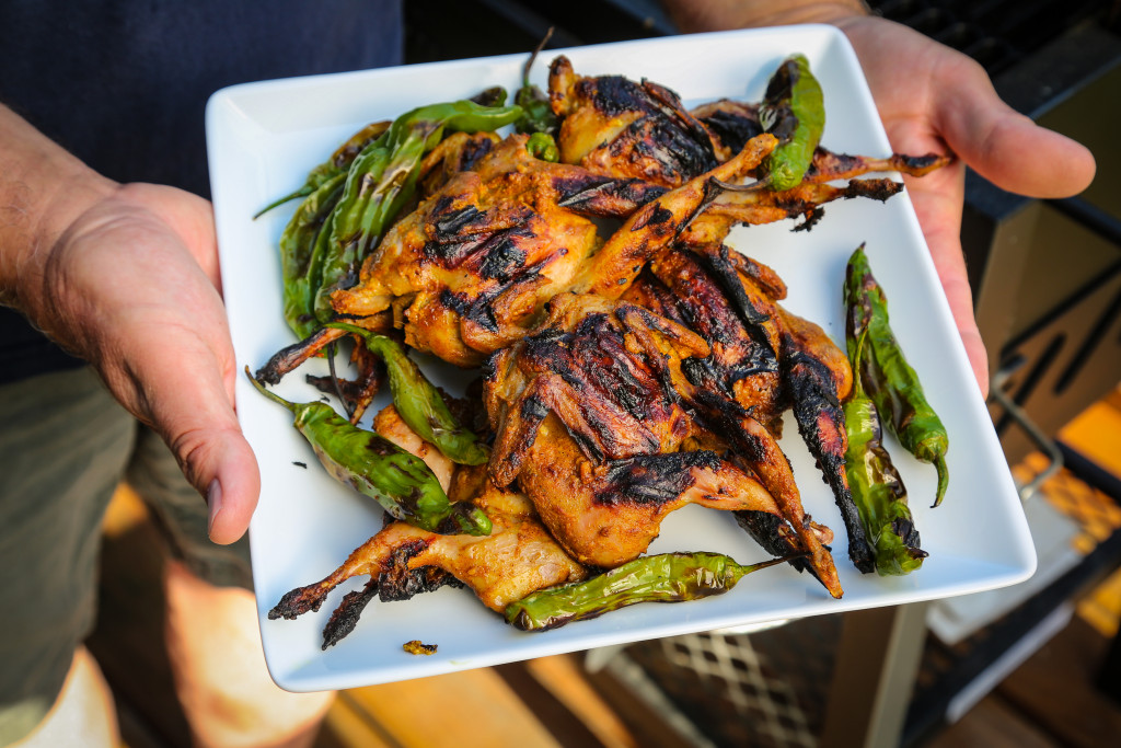 Grilled quail marinated in yogurt and curry.