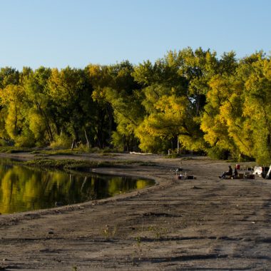 Camping and fishing on Lake Minatare shoreline