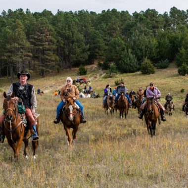 Horseback riders trail riding at the Nebraska National Forest at Halsey.