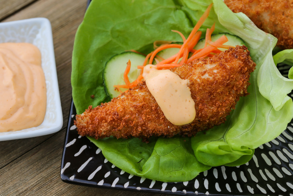 Perch fish fillet coated in panko breadcrumbs and fried, served in a lettuce wrap with spicy mayo.