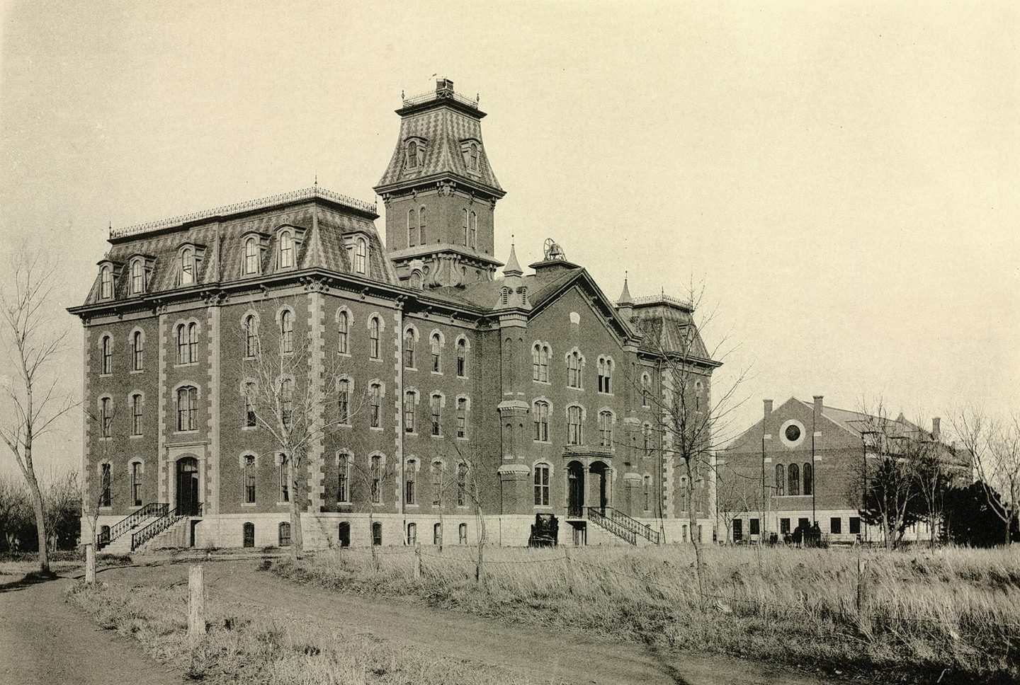 UNL building fenced by barbed wire.