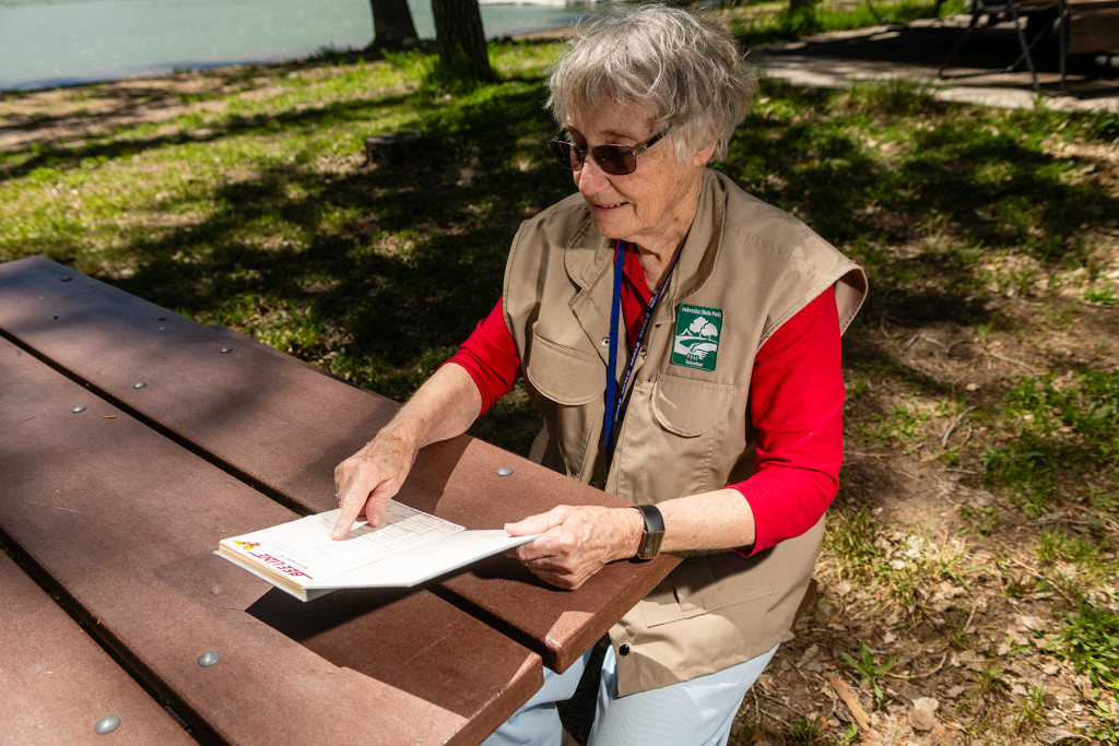 Eleanor Shimek at a picnic table with her journal.