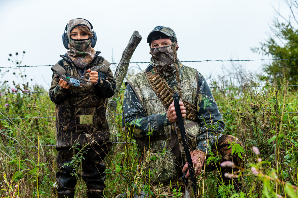 A boy and his grandfather waterfowl hunting on public land in Nebraska.