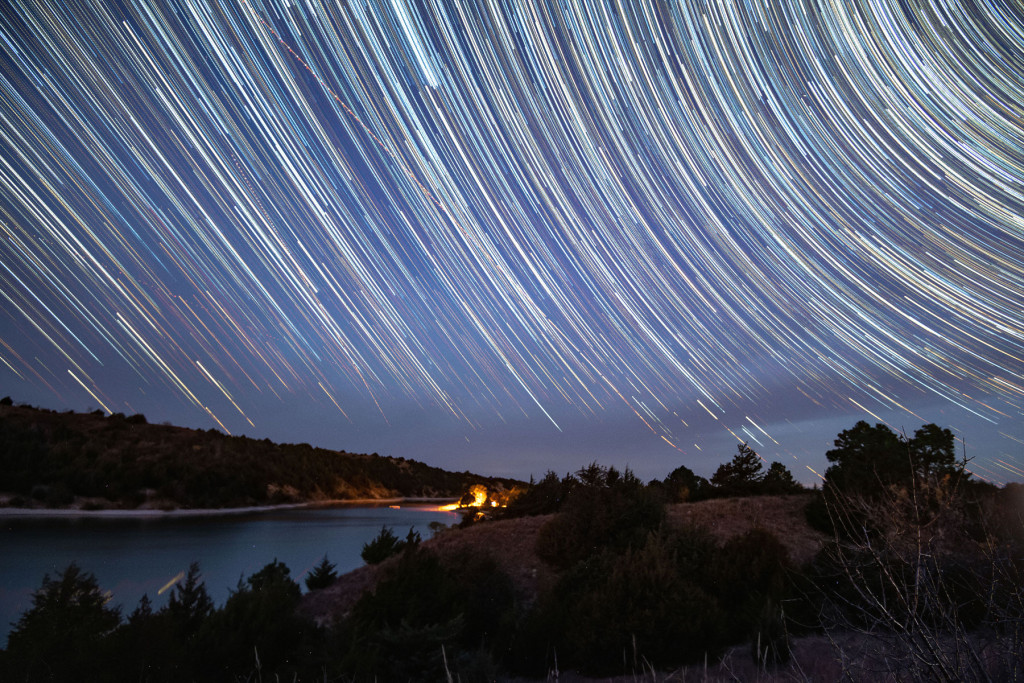 A Photoshop composite of 198 images shows the movement of Earth in relation to the stars at Merritt Reservoir.